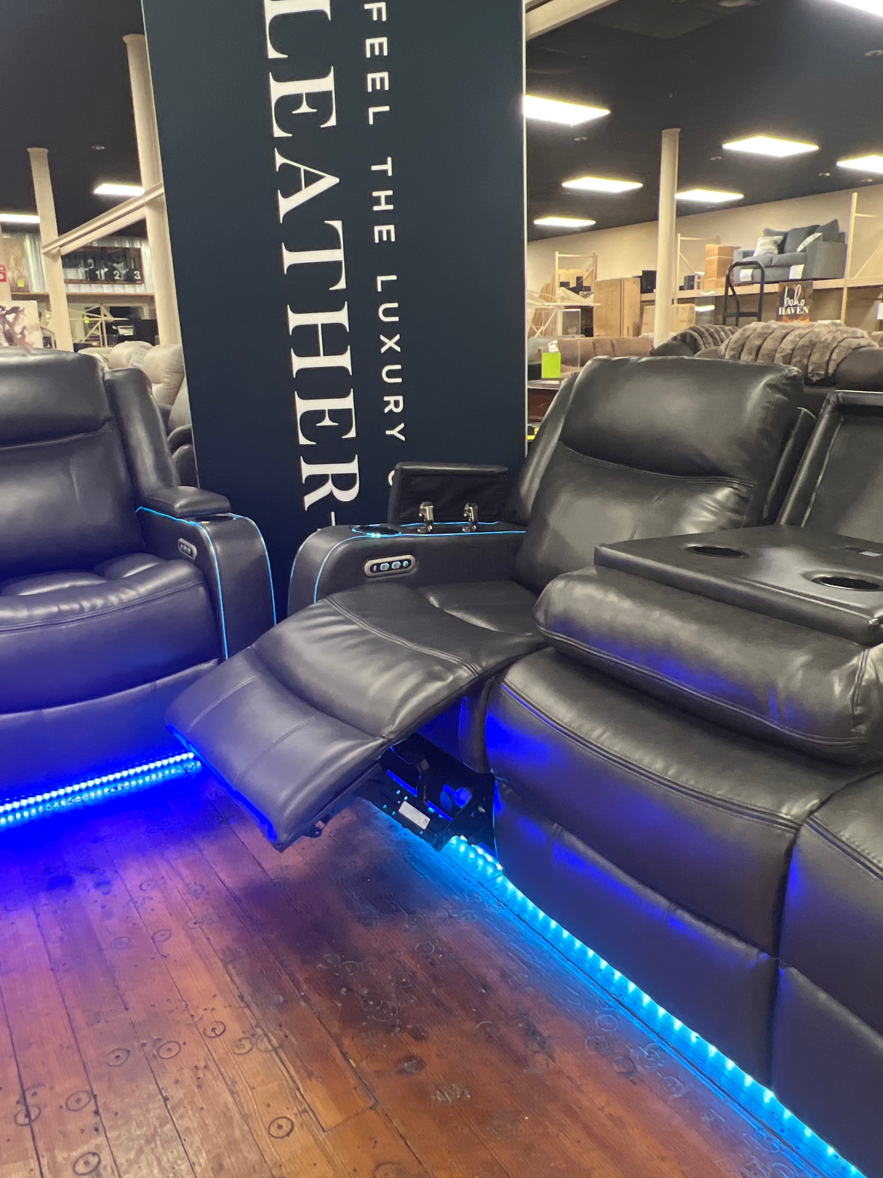 Charcoal Reclining Sofa & Loveseat with sound system and ambient lighting