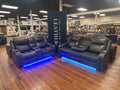 Charcoal Reclining Sofa & Loveseat with sound system and ambient lighting
